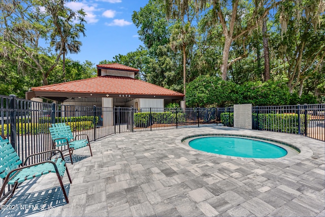 79 Sanchez Dr E, Ponte Vedra Beach, FL 32082 - view of pool featuring a gazebo, a patio area, and view of scattered trees