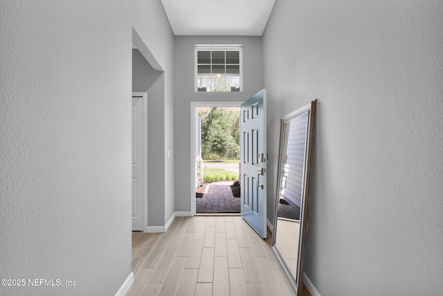 202 Purus Way, Jacksonville, FL 32259 - entryway with baseboards, light wood finished floors, and a textured wall