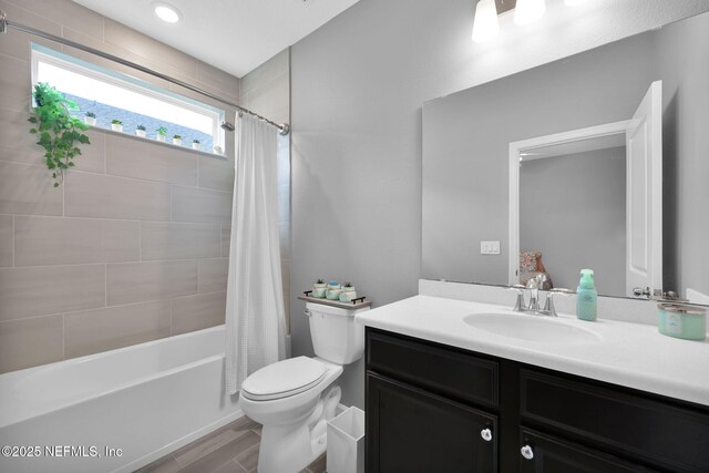 202 Purus Way, Jacksonville, FL 32259 - bathroom featuring toilet, vanity, shower / tub combo, and wood finished floors