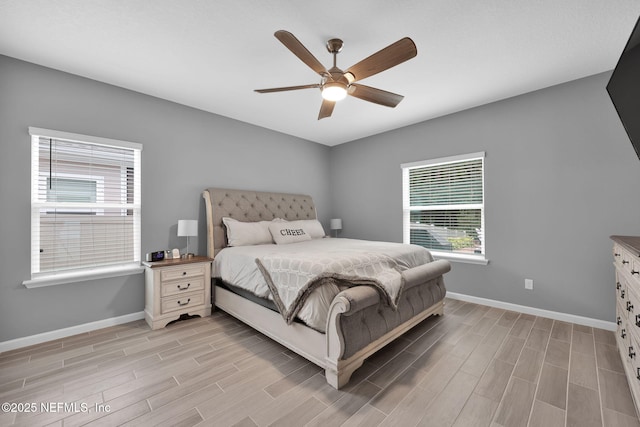 202 Purus Way, Jacksonville, FL 32259 - bedroom featuring light wood-type flooring, baseboards, and a ceiling fan