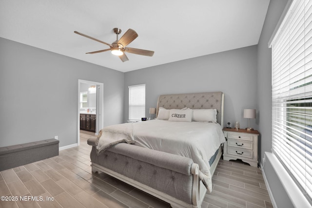 202 Purus Way, Jacksonville, FL 32259 - bedroom with wood finish floors, baseboards, ceiling fan, and ensuite bathroom