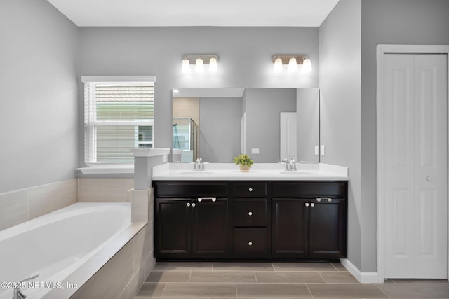 202 Purus Way, Jacksonville, FL 32259 - bathroom featuring double vanity, a bath, a closet, and a shower with shower door