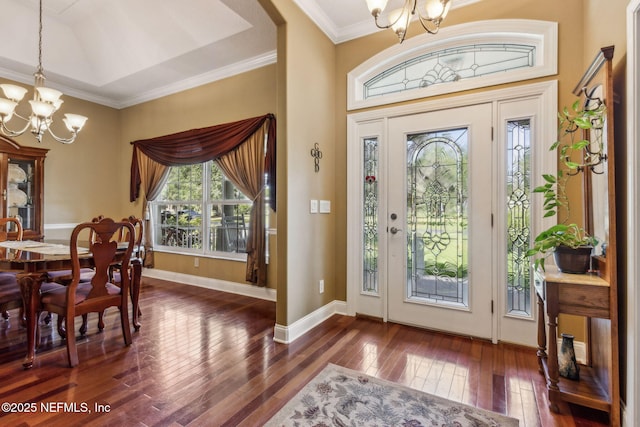 166 Mount Royal Ave, Crescent City, FL 32112 - entrance foyer with a chandelier, wood-type flooring, baseboards, and crown molding