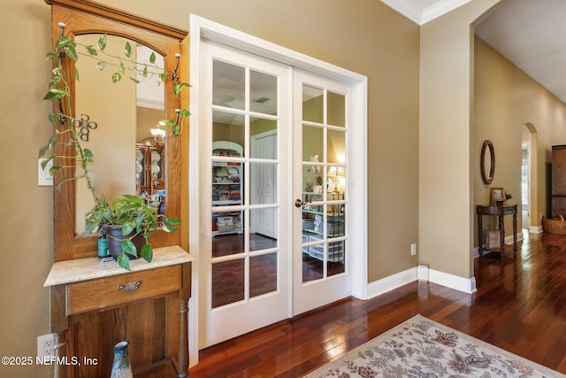 166 Mount Royal Ave, Crescent City, FL 32112 - doorway to outside with arched walkways, hardwood / wood-style floors, baseboards, and crown molding