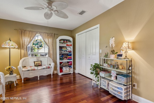 166 Mount Royal Ave, Crescent City, FL 32112 - sitting room with wood finished floors, ceiling fan, baseboards, and arched walkways