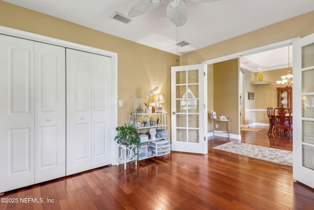 166 Mount Royal Ave, Crescent City, FL 32112 - living area featuring a chandelier, french doors, and hardwood / wood-style flooring