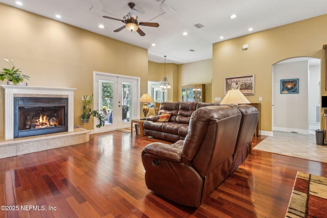 166 Mount Royal Ave, Crescent City, FL 32112 - living area with arched walkways, ceiling fan, a high ceiling, wood-type flooring, and recessed lighting