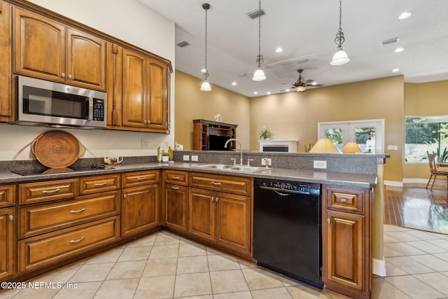 166 Mount Royal Ave, Crescent City, FL 32112 - kitchen featuring black appliances, a sink, light tile patterned floors, brown cabinetry, and ceiling fan