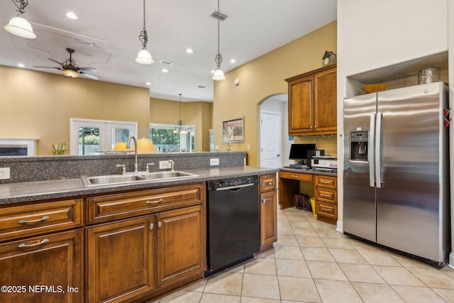 166 Mount Royal Ave, Crescent City, FL 32112 - kitchen featuring stainless steel fridge, dishwasher, a sink, dark countertops, and ceiling fan
