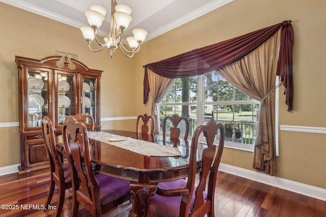 166 Mount Royal Ave, Crescent City, FL 32112 - dining room with a chandelier, baseboards, ornamental molding, and wood finished floors