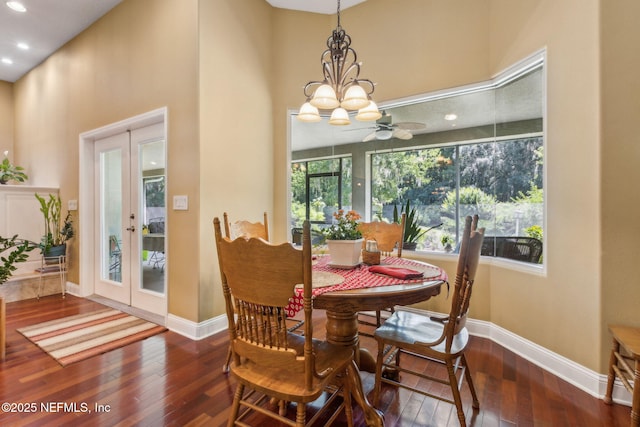 166 Mount Royal Ave, Crescent City, FL 32112 - dining area with baseboards, hardwood / wood-style floors, a towering ceiling, french doors, and ceiling fan