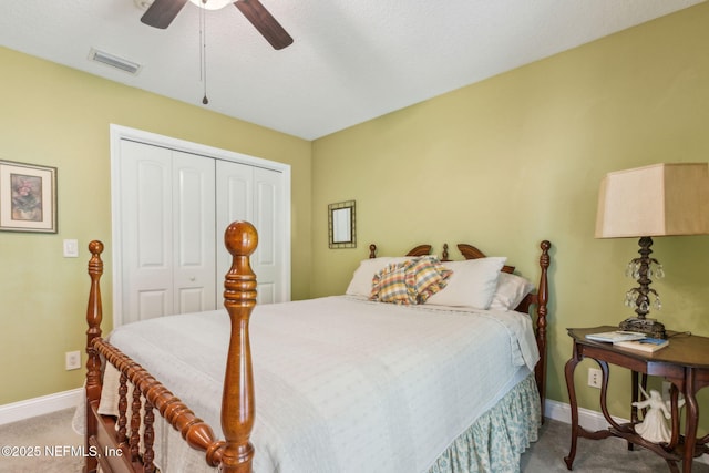 166 Mount Royal Ave, Crescent City, FL 32112 - bedroom with light carpet, a closet, baseboards, and a ceiling fan