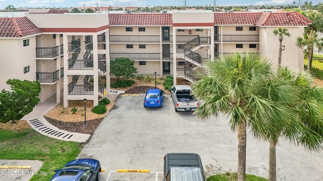 4250 A1A S Unit C15, Saint Augustine, FL 32080 - view of building exterior with uncovered parking and stairs