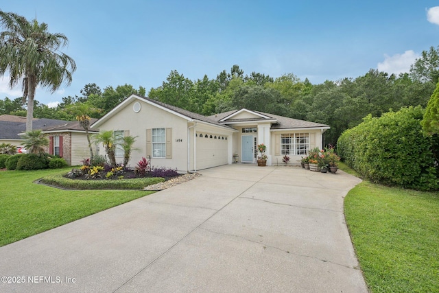 1494 Cedar Grove Ter, Fleming Island, FL 32003 - single story home featuring a garage, a front lawn, concrete driveway, and stucco siding