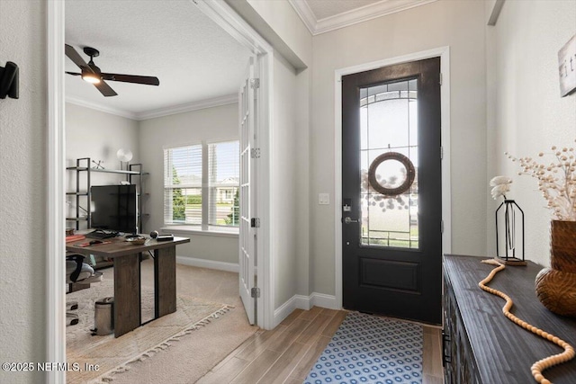 710 Stillwater Blvd, Saint Johns, FL 32259 - entrance foyer featuring light wood finished floors, ornamental molding, baseboards, and a ceiling fan