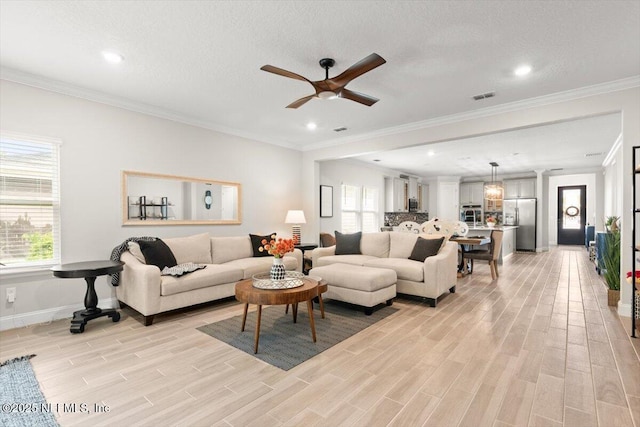 710 Stillwater Blvd, Saint Johns, FL 32259 - living area featuring light wood-style flooring, a ceiling fan, healthy amount of natural light, baseboards, and recessed lighting