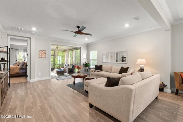 710 Stillwater Blvd, Saint Johns, FL 32259 - living area with a ceiling fan, light wood-style flooring, crown molding, baseboards, and recessed lighting