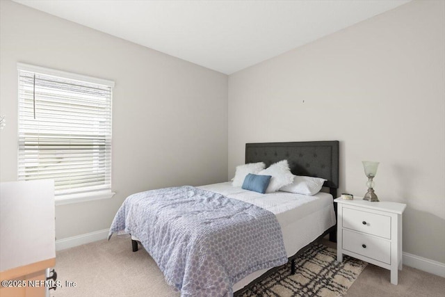 710 Stillwater Blvd, Saint Johns, FL 32259 - bedroom with light carpet, baseboards, and multiple windows