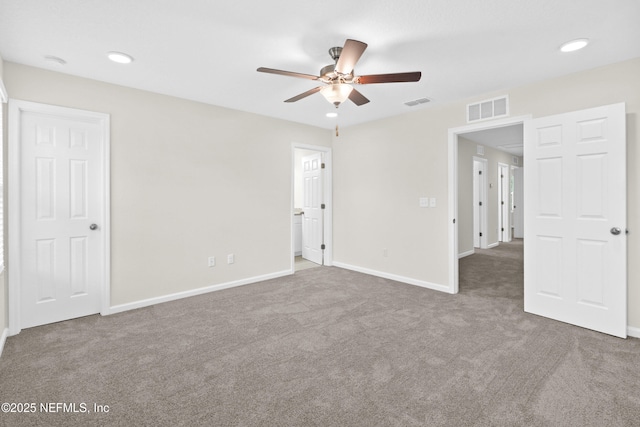 8198 Dandy Ave, Jacksonville, FL 32211 - unfurnished bedroom featuring carpet, baseboards, recessed lighting, a ceiling fan, and ensuite bath