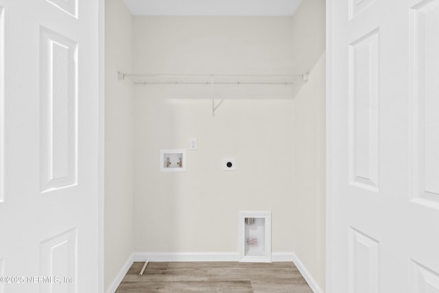 8198 Dandy Ave, Jacksonville, FL 32211 - washroom with hookup for an electric dryer, hookup for a washing machine, wood finished floors, and baseboards