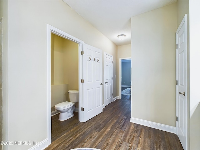 85667 Berryessa Way, Fernandina Beach, FL 32034 - bathroom featuring toilet, wood finished floors, and baseboards