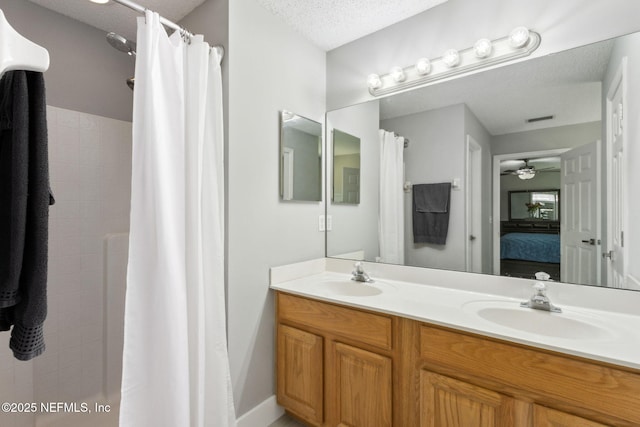 1254 Palisades Dr, Jacksonville, FL 32221 - full bath featuring ensuite bath, double vanity, a textured ceiling, a shower with shower curtain, and a ceiling fan