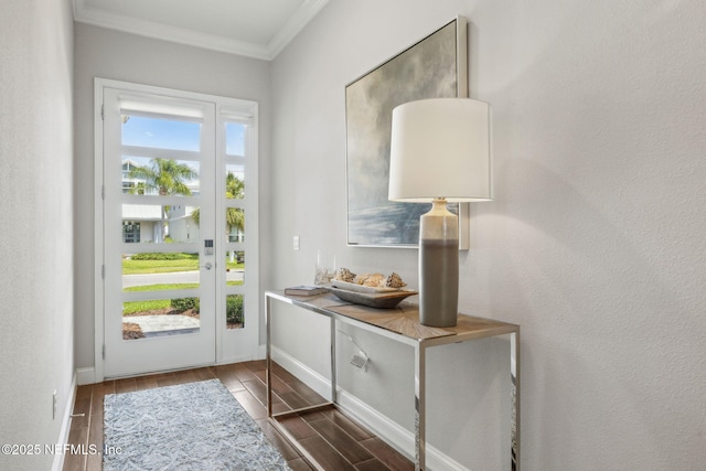 244 Caribbean Pl, Saint Johns, FL 32259 - doorway to outside with crown molding, dark wood-type flooring, and baseboards