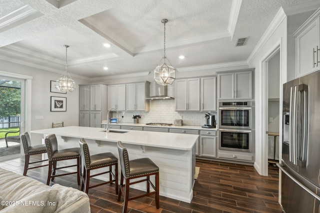 244 Caribbean Pl, Saint Johns, FL 32259 - kitchen with appliances with stainless steel finishes, a sink, gray cabinets, a chandelier, and tasteful backsplash