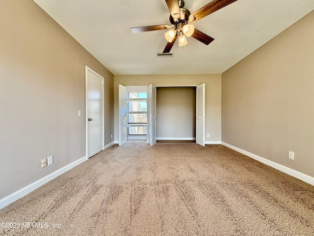 7779 Las Palmas Way Unit 114, Jacksonville, FL 32256 - unfurnished bedroom with baseboards, carpet flooring, a closet, and ceiling fan