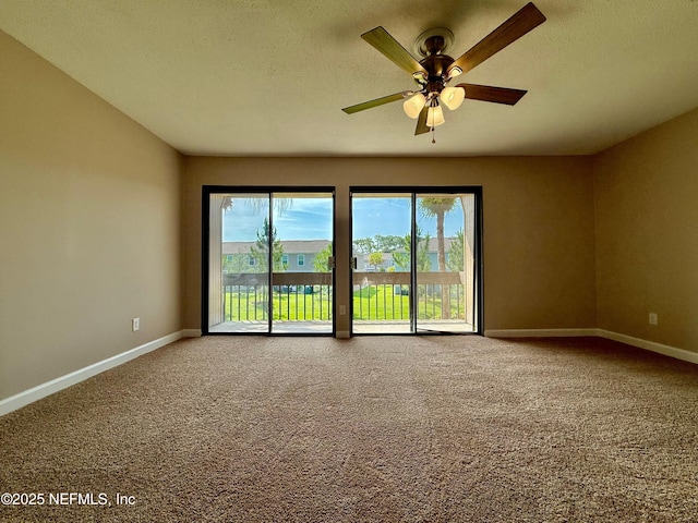 7779 Las Palmas Way Unit 114, Jacksonville, FL 32256 - carpeted empty room with a ceiling fan, baseboards, and a textured ceiling