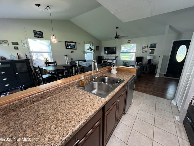 117 Eliam Rd, Melrose, FL 32666 - kitchen with a sink, dishwasher, ceiling fan, vaulted ceiling, and hanging light fixtures