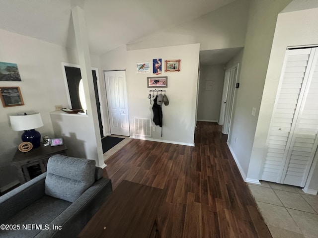 117 Eliam Rd, Melrose, FL 32666 - corridor with lofted ceiling, wood finished floors, and baseboards