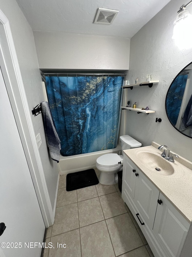 117 Eliam Rd, Melrose, FL 32666 - bathroom featuring tile patterned floors, shower / tub combo, vanity, toilet, and a textured wall
