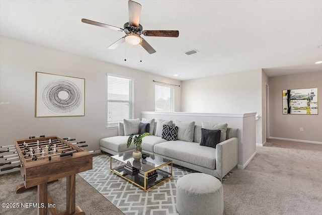 1011 Wetland Ridge Cir, Middleburg, FL 32068 - living area with carpet floors, ceiling fan, and baseboards