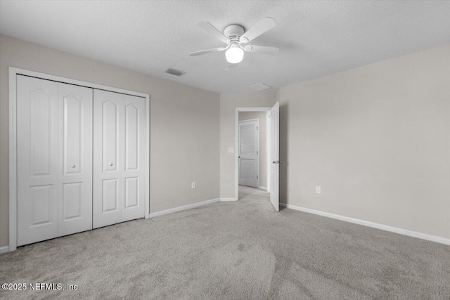 1011 Wetland Ridge Cir, Middleburg, FL 32068 - unfurnished bedroom with carpet flooring, baseboards, a closet, and ceiling fan