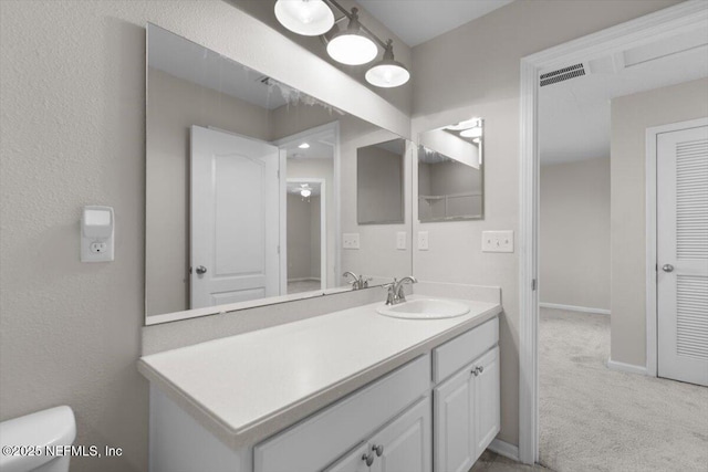 1011 Wetland Ridge Cir, Middleburg, FL 32068 - bathroom with vanity, toilet, and baseboards