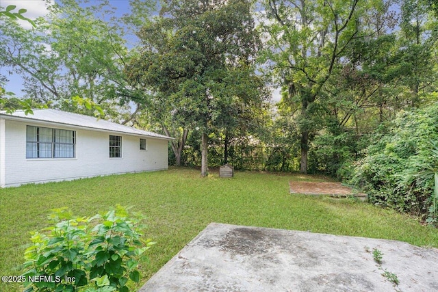318 W Lafayette St, Starke, FL 32091 - view of green lawn with a patio area