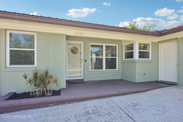 1515 Husson Ave, Palatka, FL 32177 - entrance to property featuring brick siding and metal roof