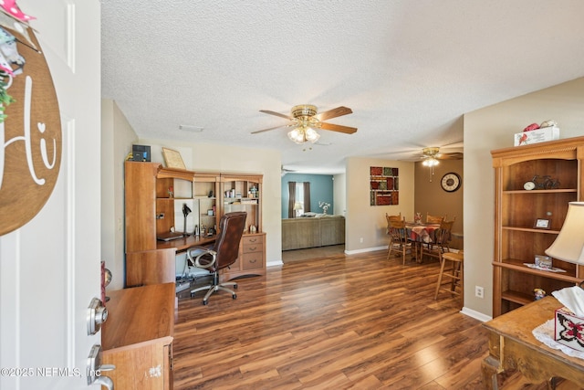 1515 Husson Ave, Palatka, FL 32177 - office featuring wood finished floors, ceiling fan, a textured ceiling, and baseboards