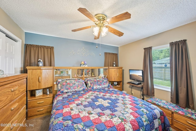 1515 Husson Ave, Palatka, FL 32177 - carpeted bedroom featuring a textured ceiling and a ceiling fan