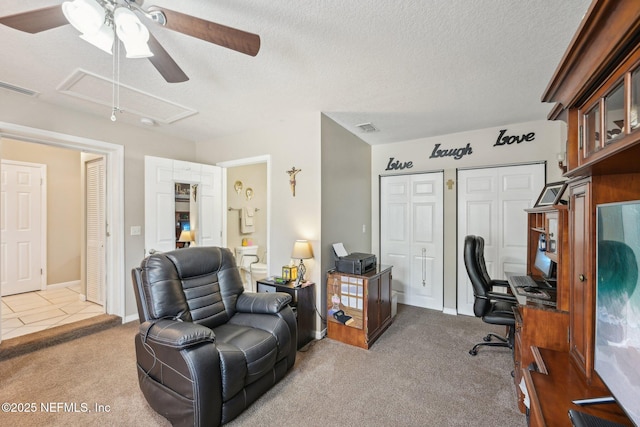 1515 Husson Ave, Palatka, FL 32177 - carpeted home office featuring ceiling fan, a textured ceiling, baseboards, and tile patterned flooring