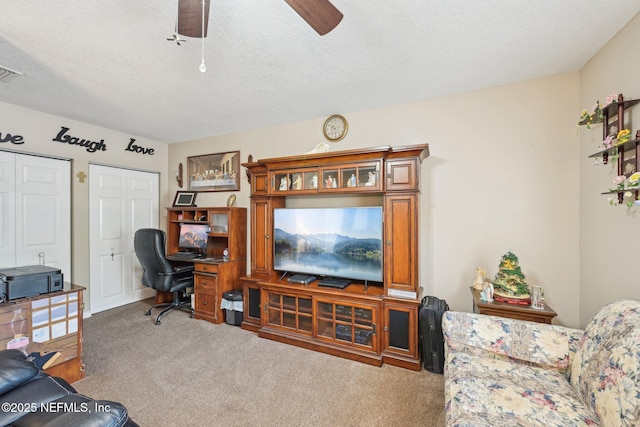 1515 Husson Ave, Palatka, FL 32177 - carpeted home office featuring a ceiling fan and a textured ceiling