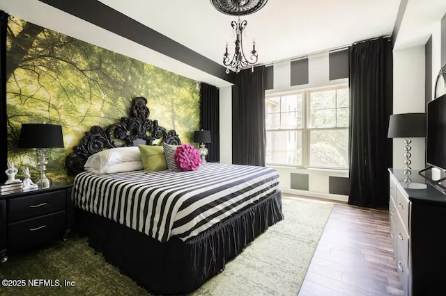 945 Registry Blvd Unit 207, Saint Augustine, FL 32092 - bedroom with wood finished floors, a chandelier, and baseboards