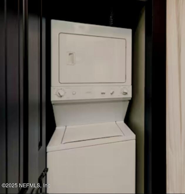 945 Registry Blvd Unit 207, Saint Augustine, FL 32092 - washroom with stacked washing machine and dryer