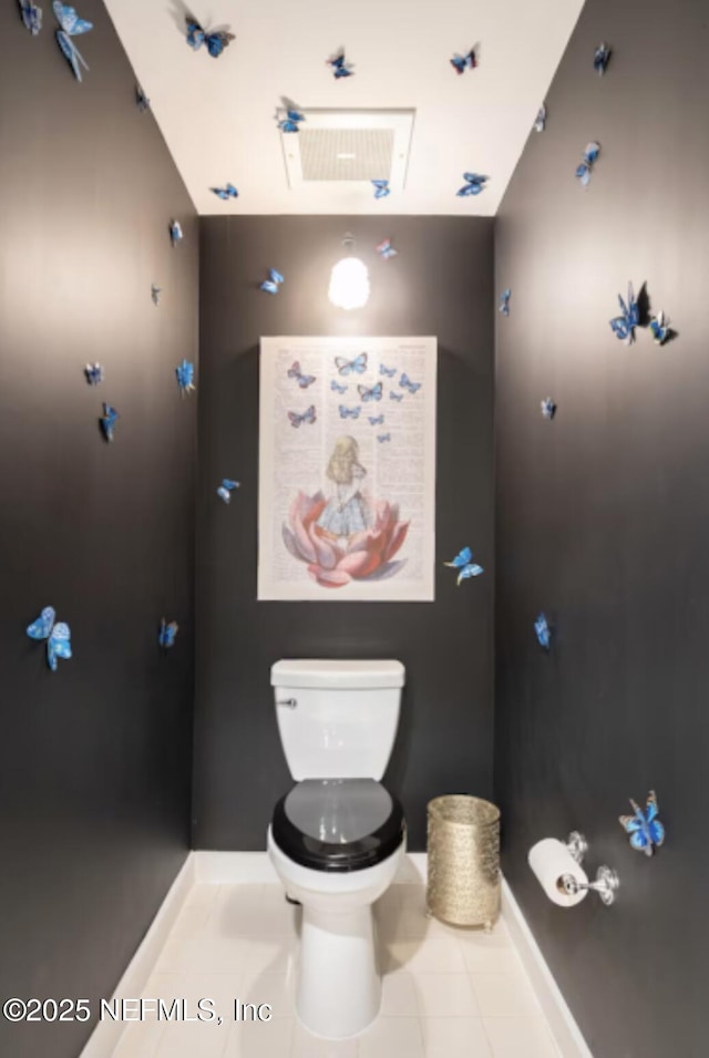 945 Registry Blvd Unit 207, Saint Augustine, FL 32092 - bathroom with toilet, baseboards, and tile patterned floors