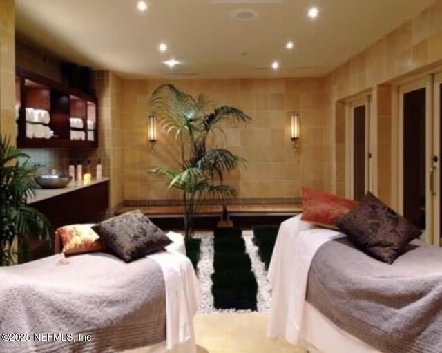 945 Registry Blvd Unit 207, Saint Augustine, FL 32092 - bedroom with recessed lighting and tile walls