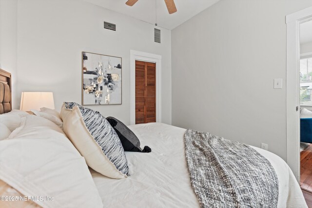 1819 Landon Ave, Jacksonville, FL 32207 - bedroom featuring a closet, wood finished floors, and a ceiling fan