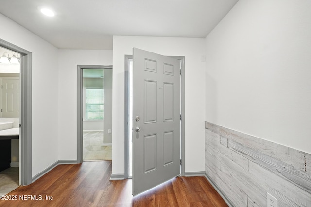 12372 Golden Bell Dr, Jacksonville, FL 32225 - foyer entrance featuring wood finished floors and baseboards