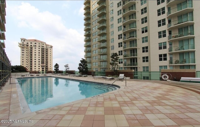 1431 Riverplace Blvd Unit 1707, Jacksonville, FL 32207 - community pool with a patio