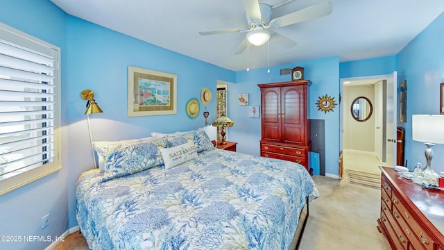 21 Mid Pines Cir, Palm Coast, FL 32137 - bedroom featuring light carpet, baseboards, and ceiling fan